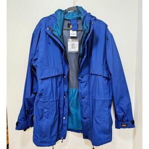 REI Vintage SzL blue jacket. Multiple pockets. Underarm vents w Zip. Double Zip